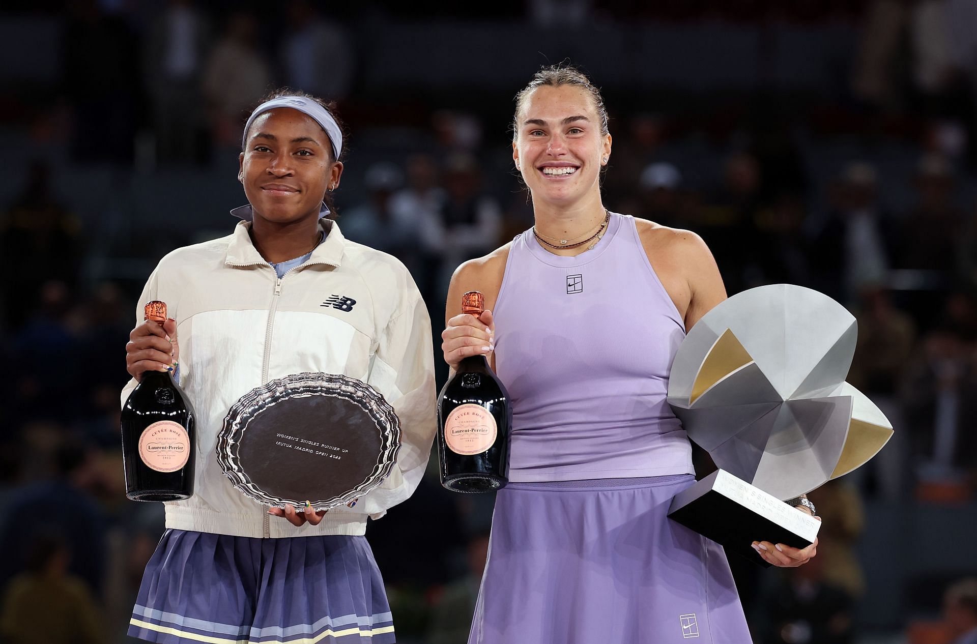 Coco Gauff (left) and Aryna Sabalenka (right) after the women's singles final at the 2025 Madrid Open (Source: Getty)